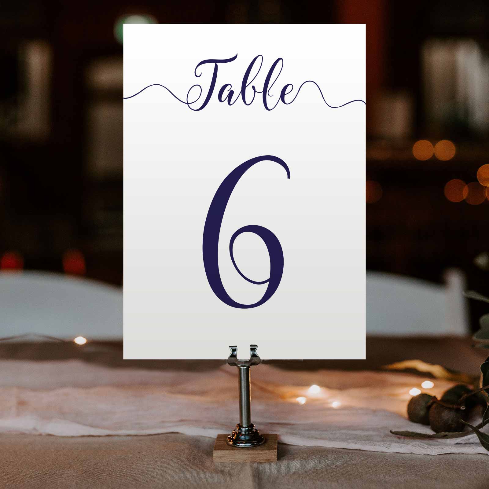 navy table number at a wedding reception