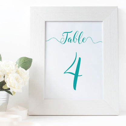 printable turquoise table number in a white frame