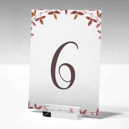 5"x7" printed autumn leaves table number in a glass stand