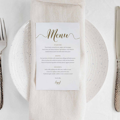 printed dinner menu on a wedding table place setting