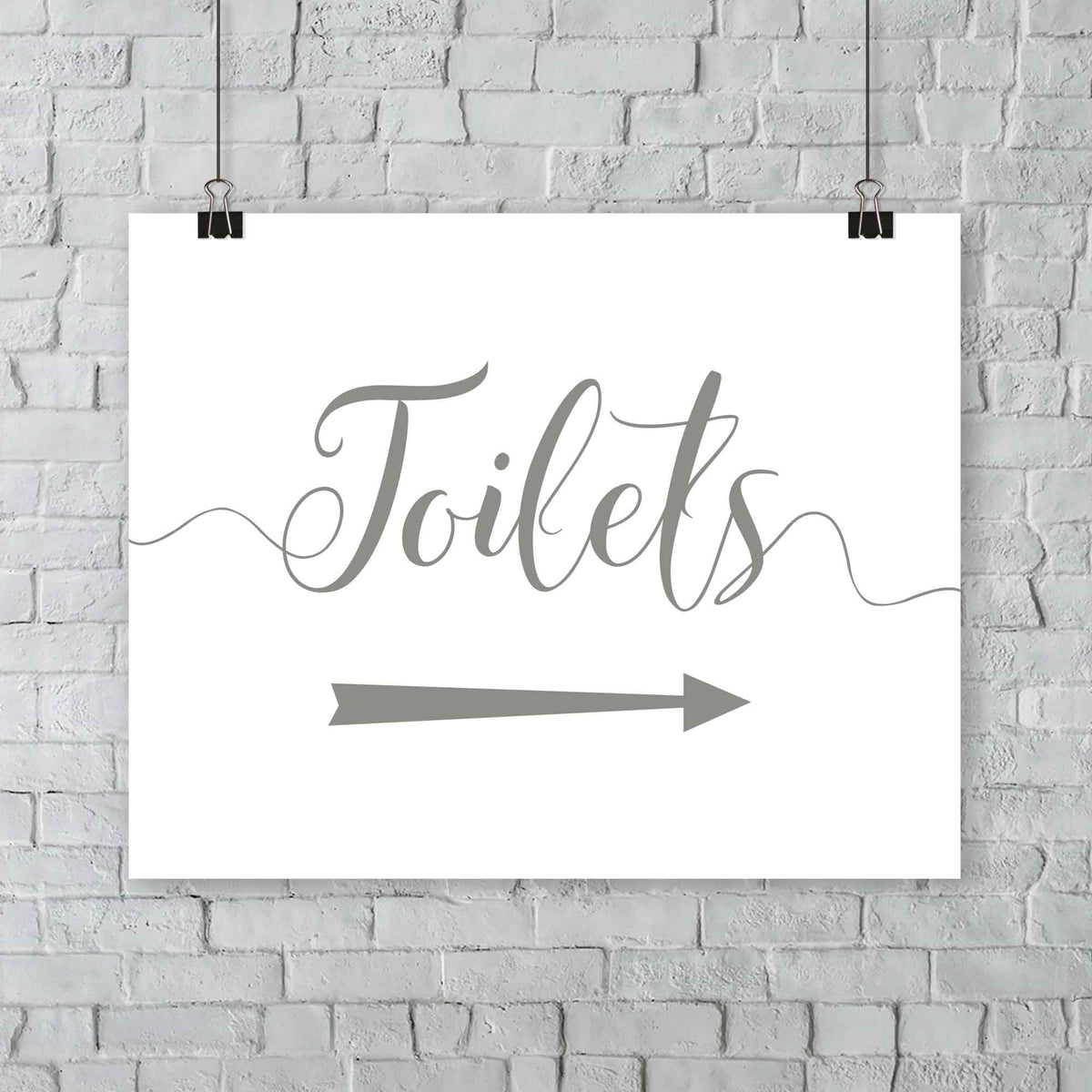 printed olive green wedding toilets arrow signage on a wall