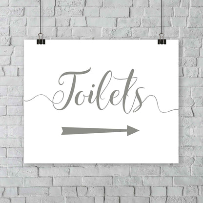 printed olive green wedding toilets arrow signage on a wall
