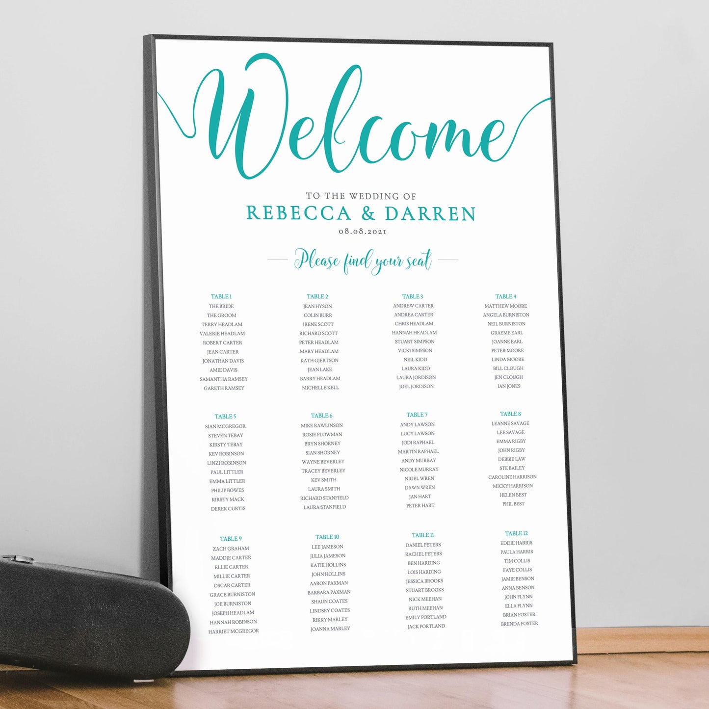 printed turquoise table plan in large frame
