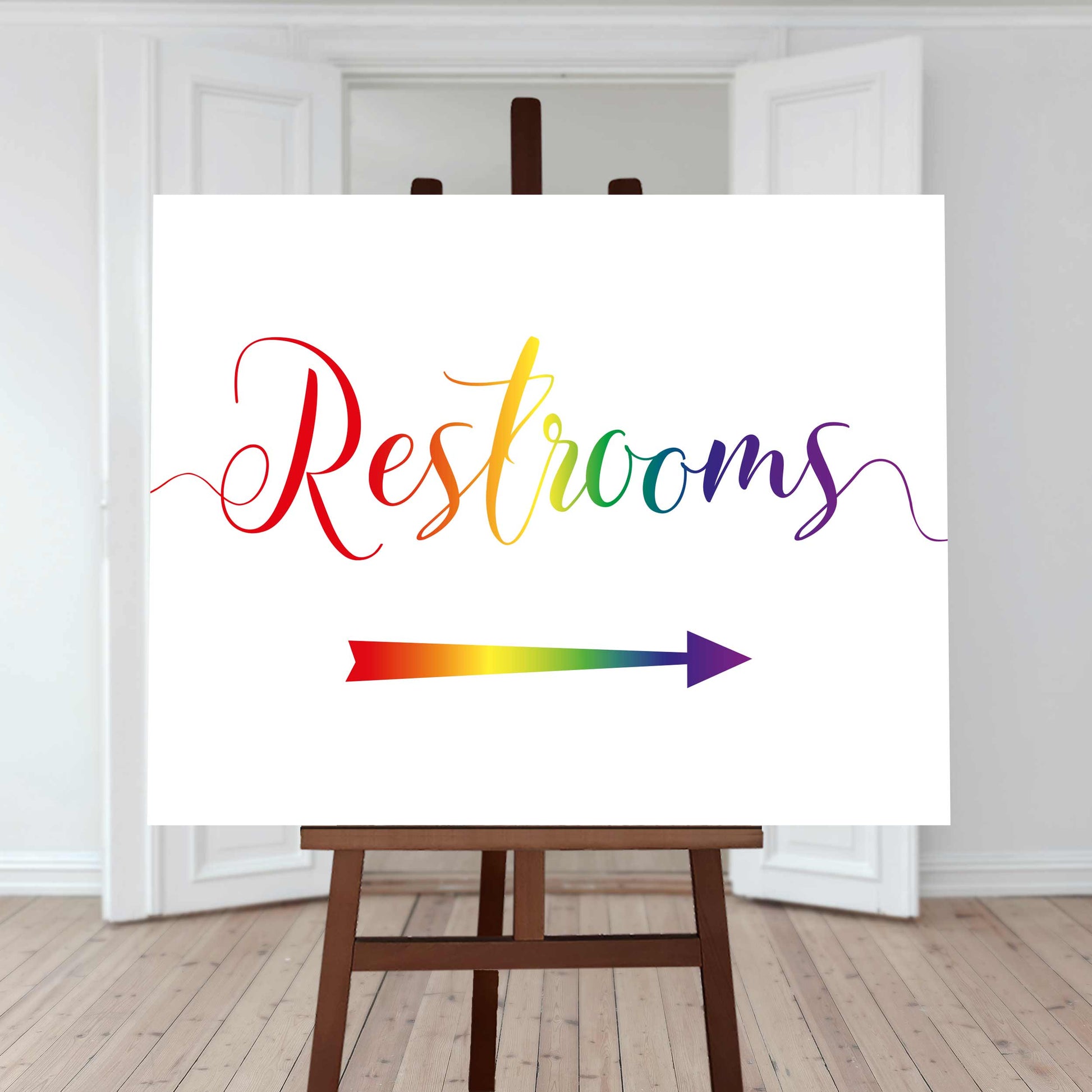 printable rainbow restrooms arrow sign at a lesbian wedding