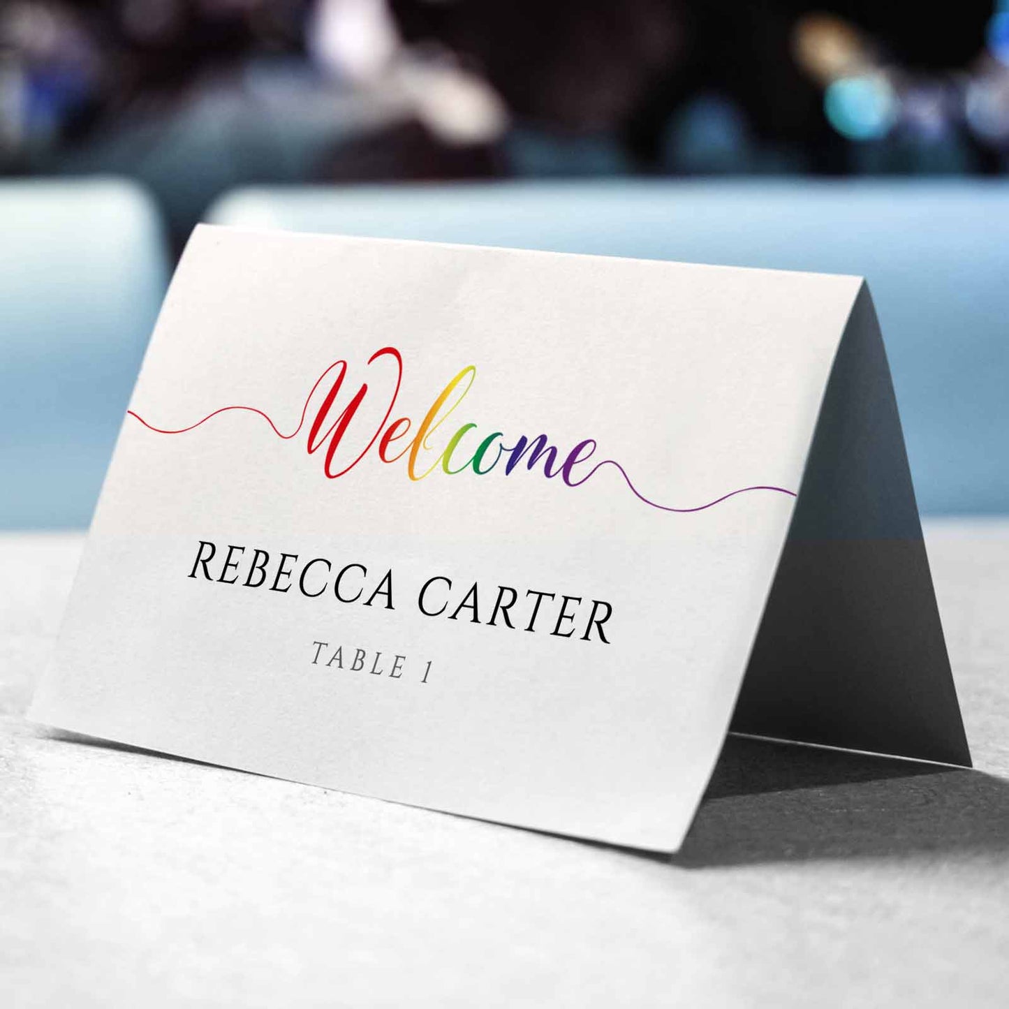 printed rainbow place cards folded into tent cards