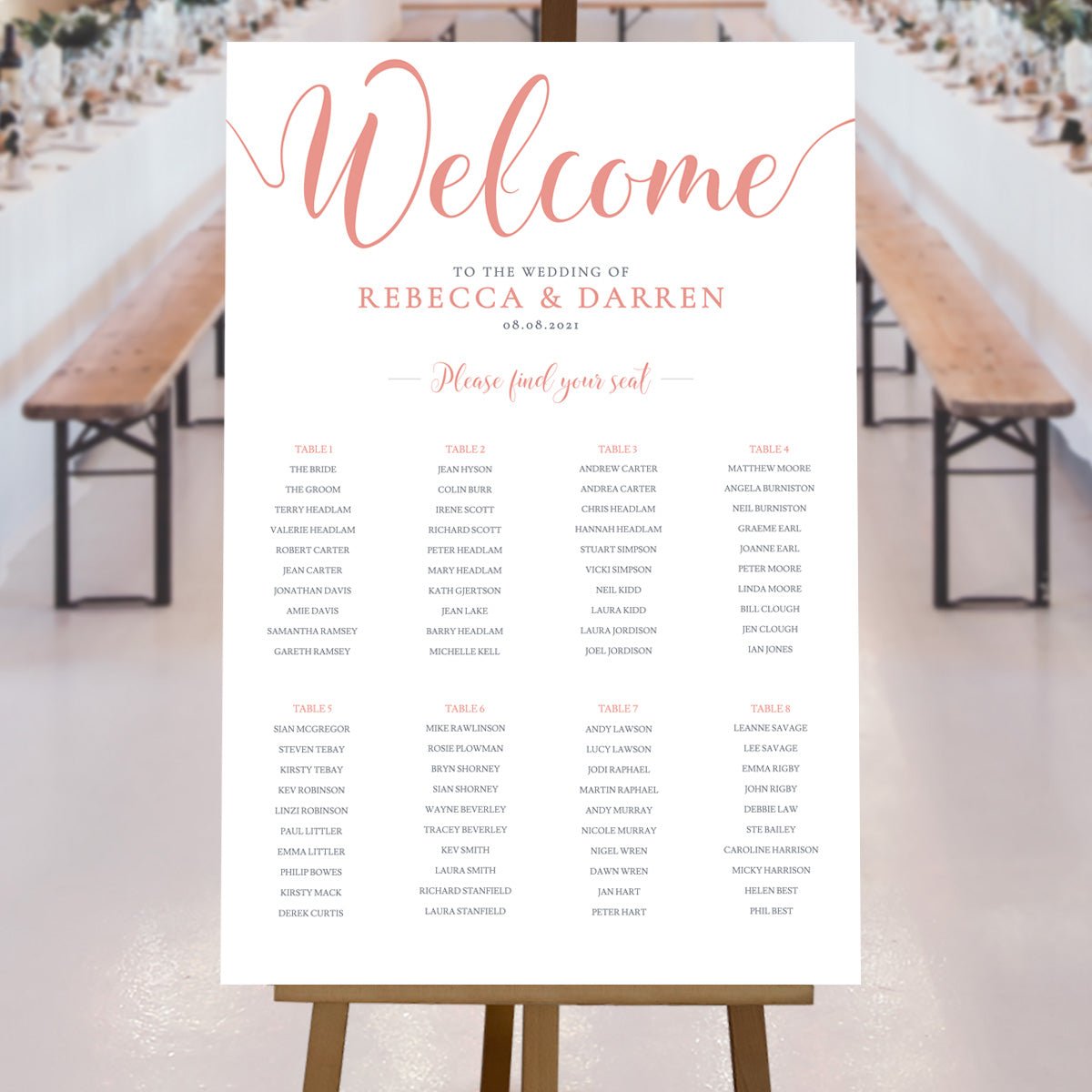 rose gold seating chart at a rustic wedding reception