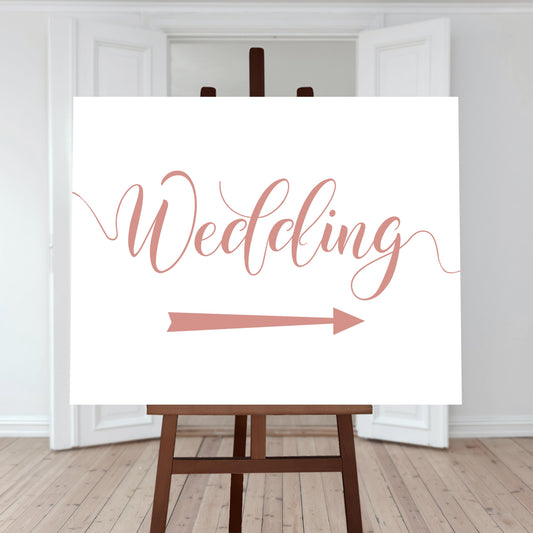 rose gold wedding directions sign with a right arrow