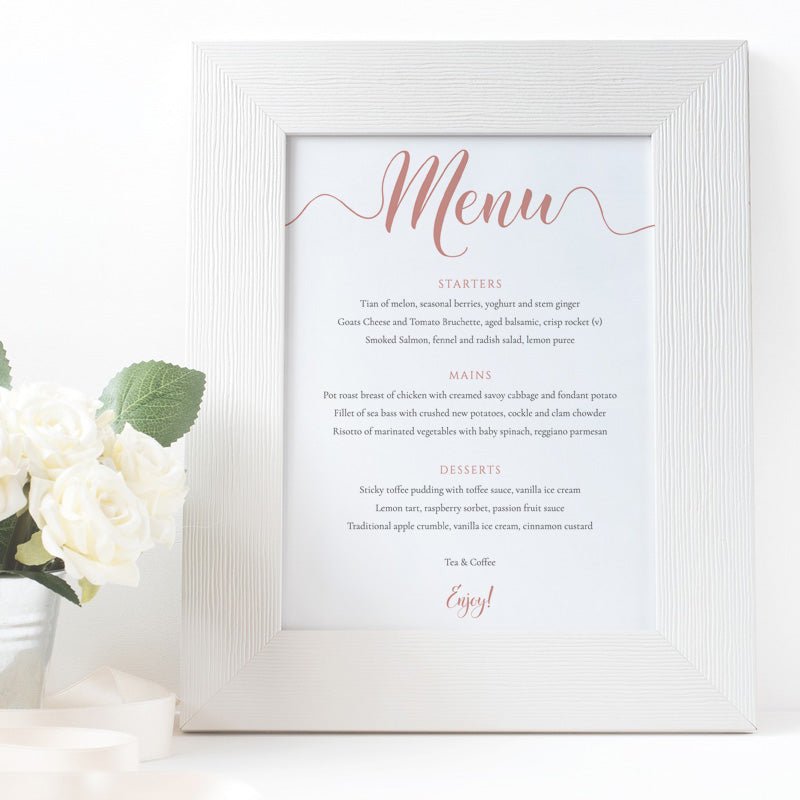 rose gold wedding menu in a white frame