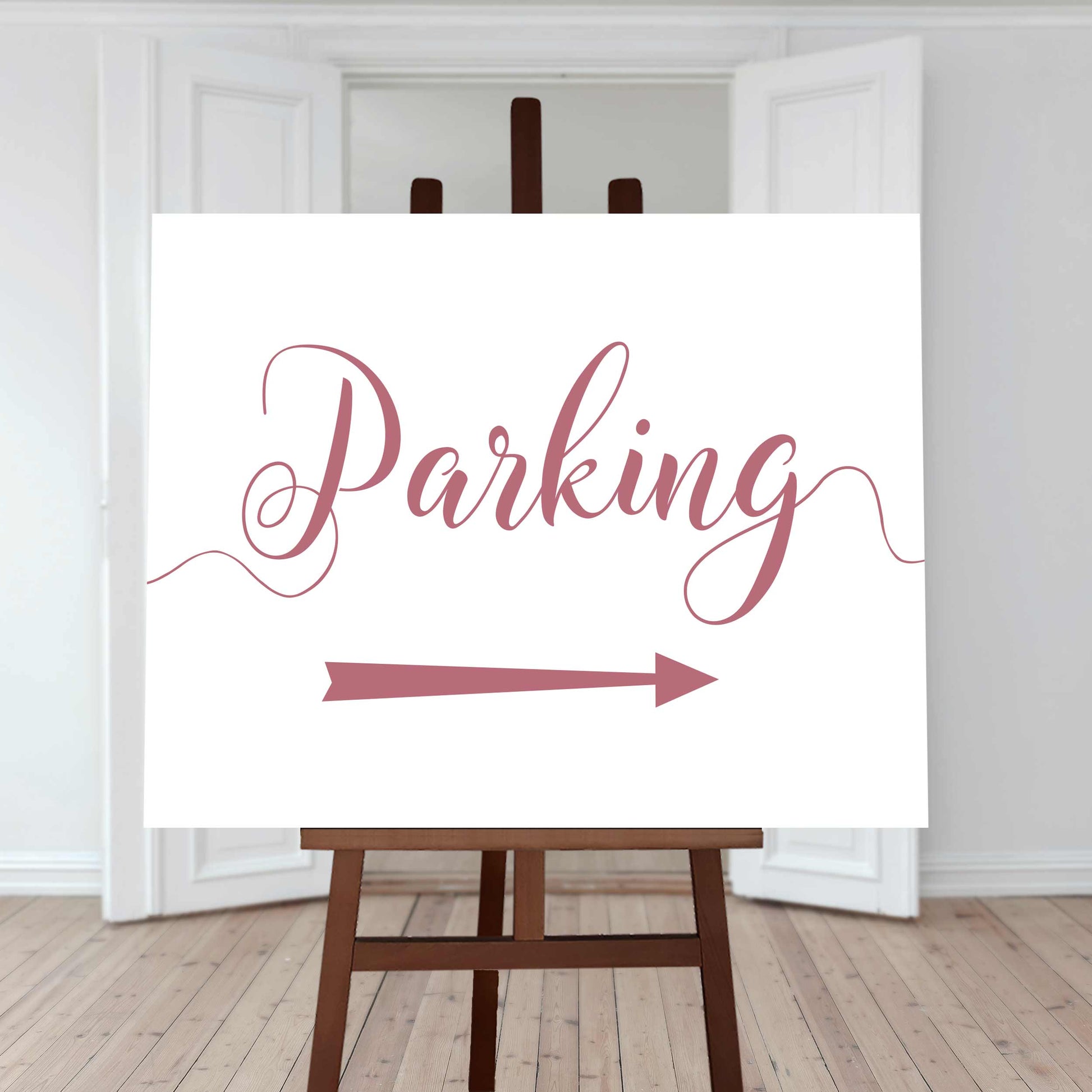 rouge pink wedding car park directions sign with an arrow pointing right