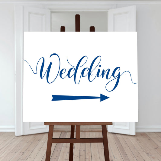 royal blue wedding directions sign with a right arrow