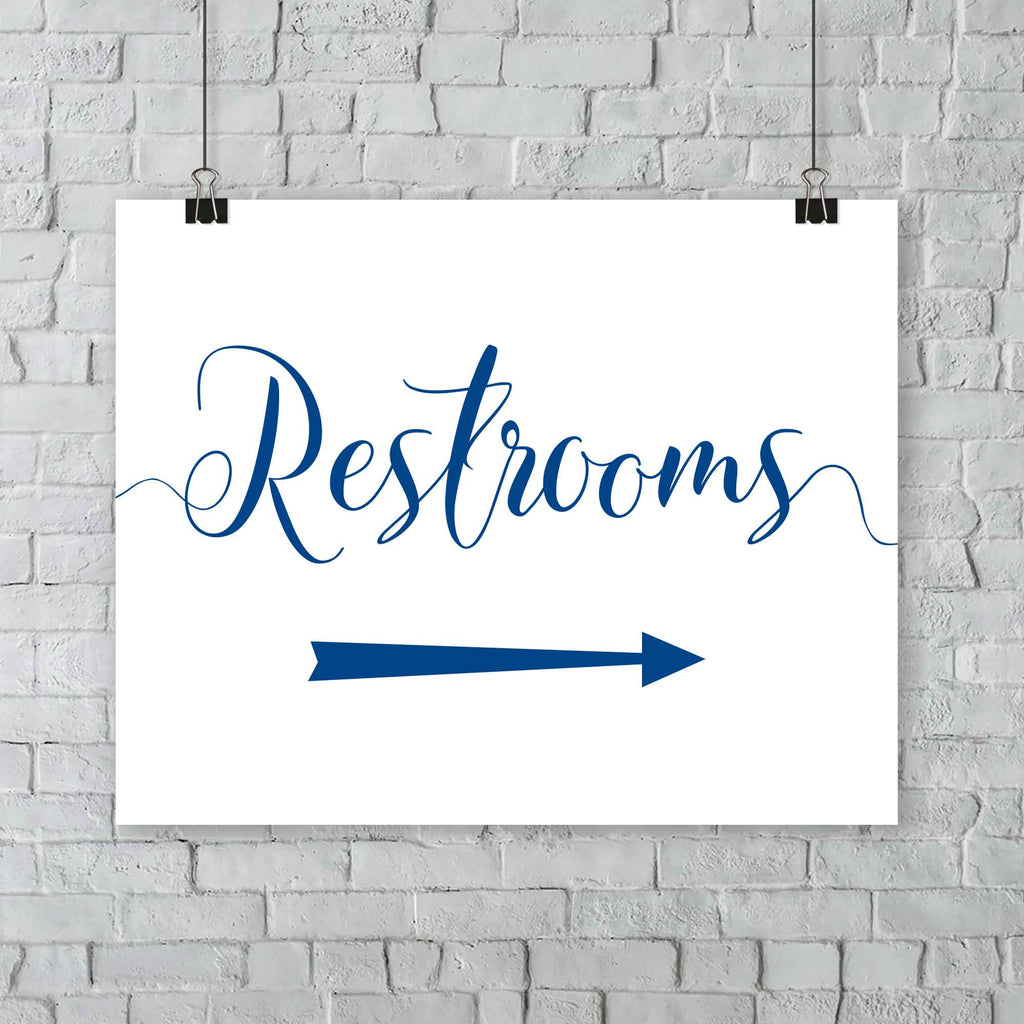 royal blue wedding restrooms arrow signage hanging from a wall