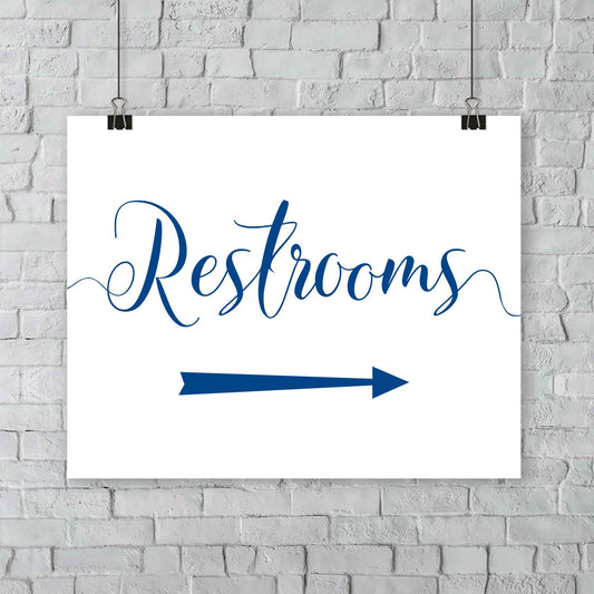 royal blue wedding restrooms arrow signage hanging from a wall
