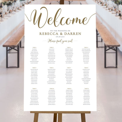 gold table plan at a rustic wedding reception