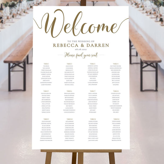 gold table plan at a rustic wedding reception