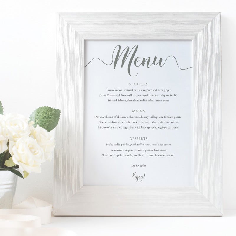 sage green wedding menu in a white frame