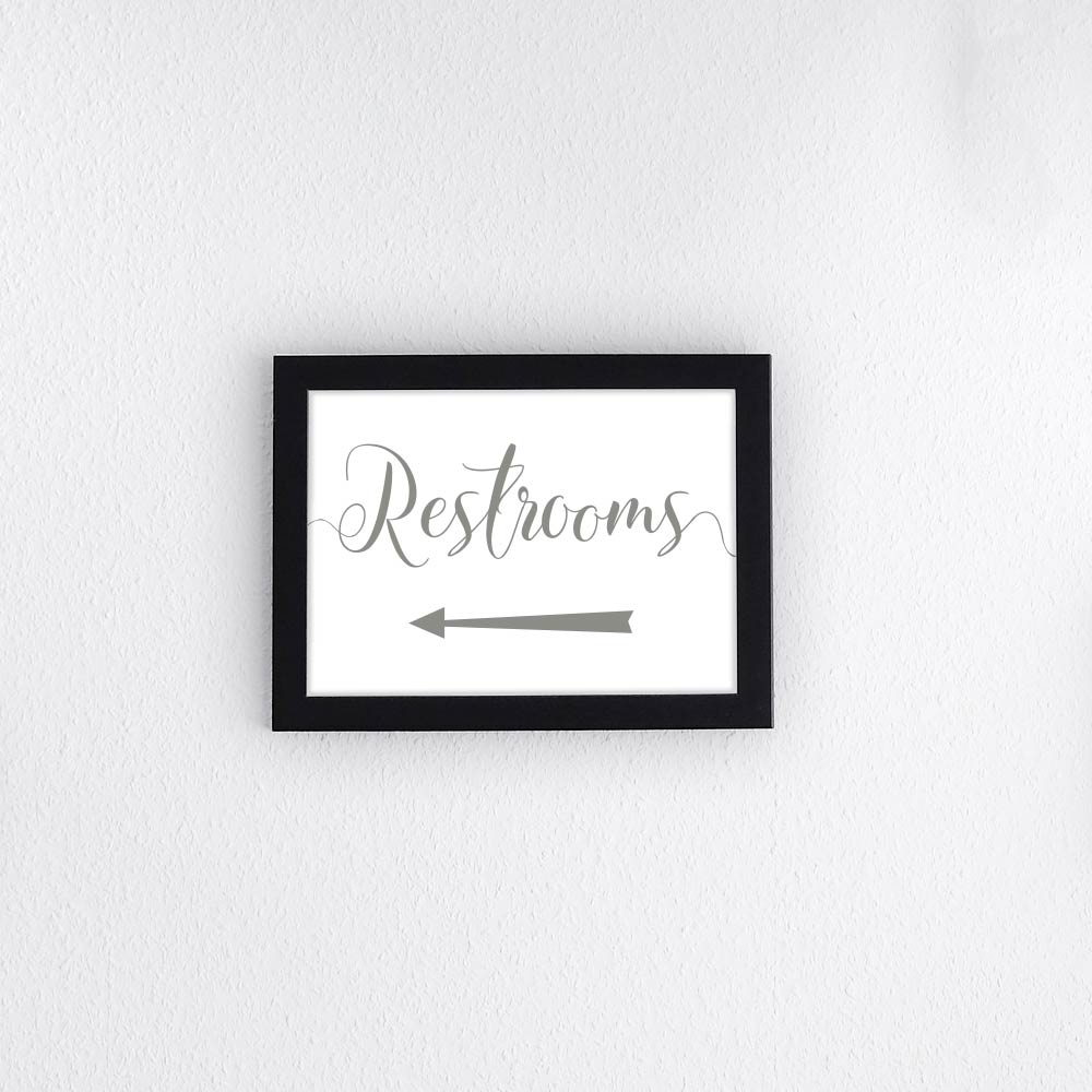 sage green wedding restrooms directional arrow sign in a frame