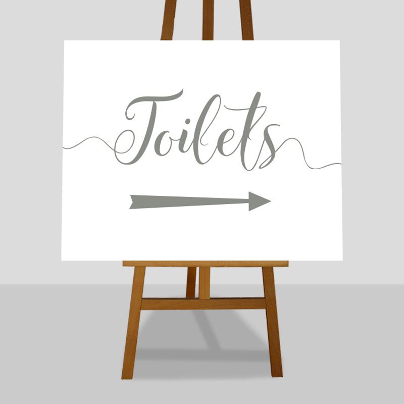 sage green wedding toilets arrow sign on an easel