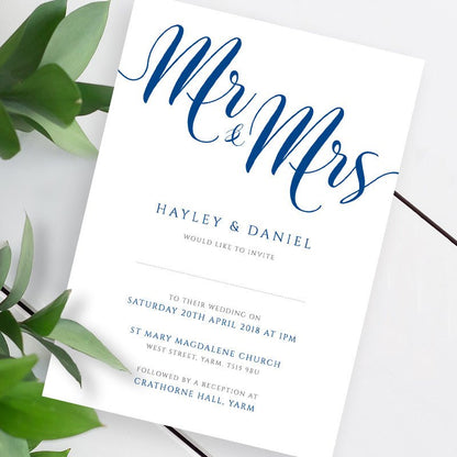 sapphire blue wedding invitation template on a white table