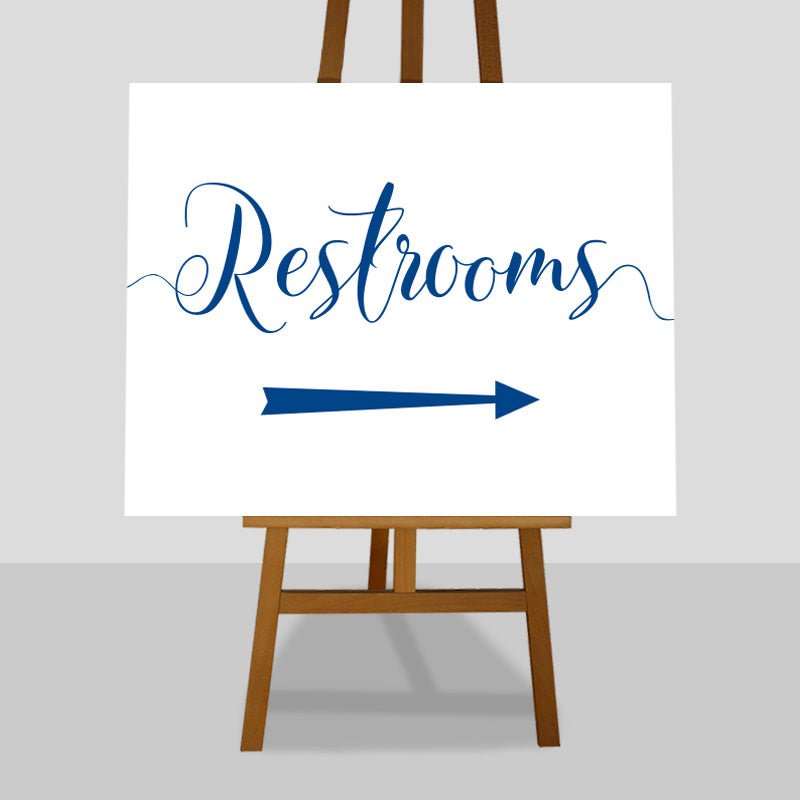 sapphire blue wedding restrooms arrow sign on an easel