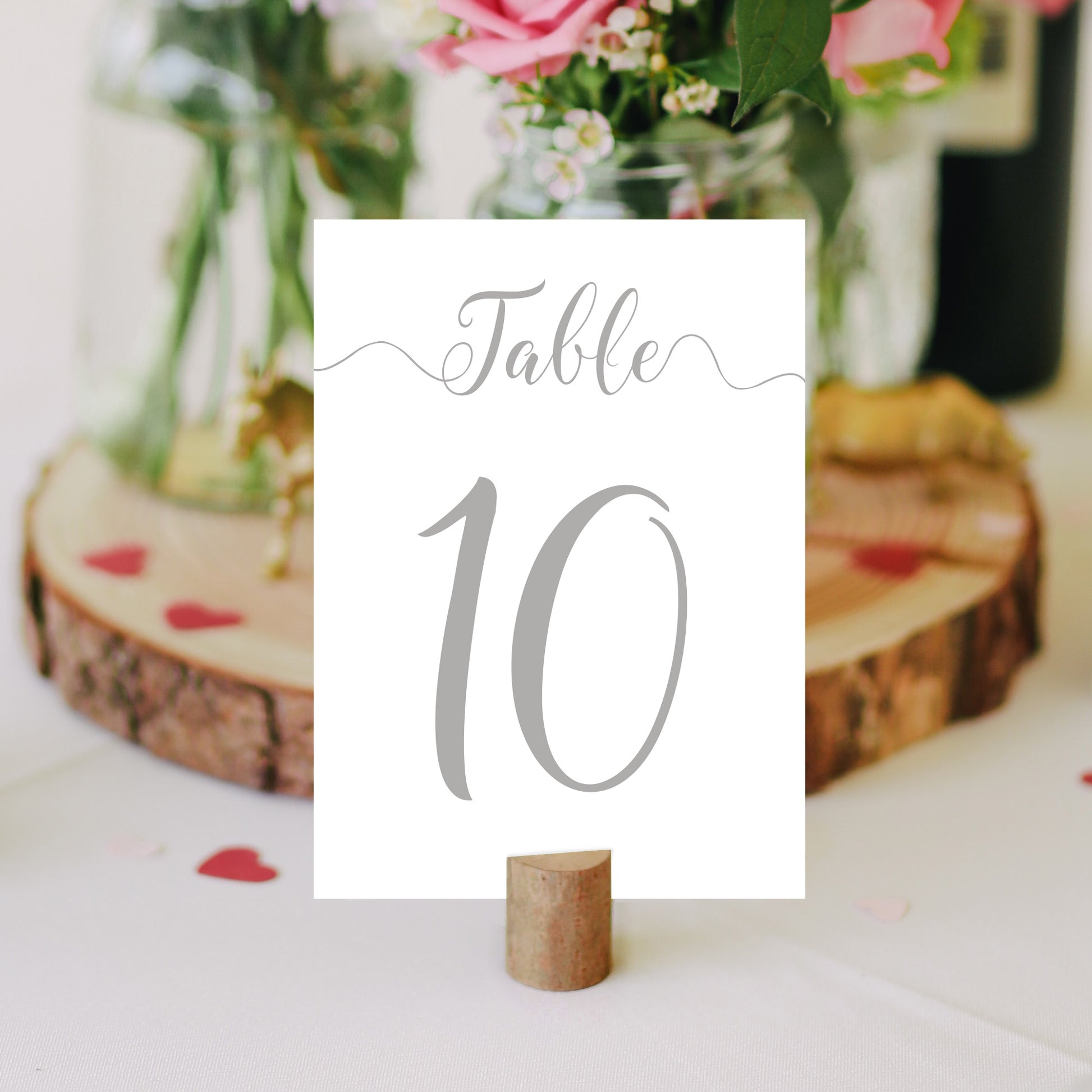 silver table number on a wedding table