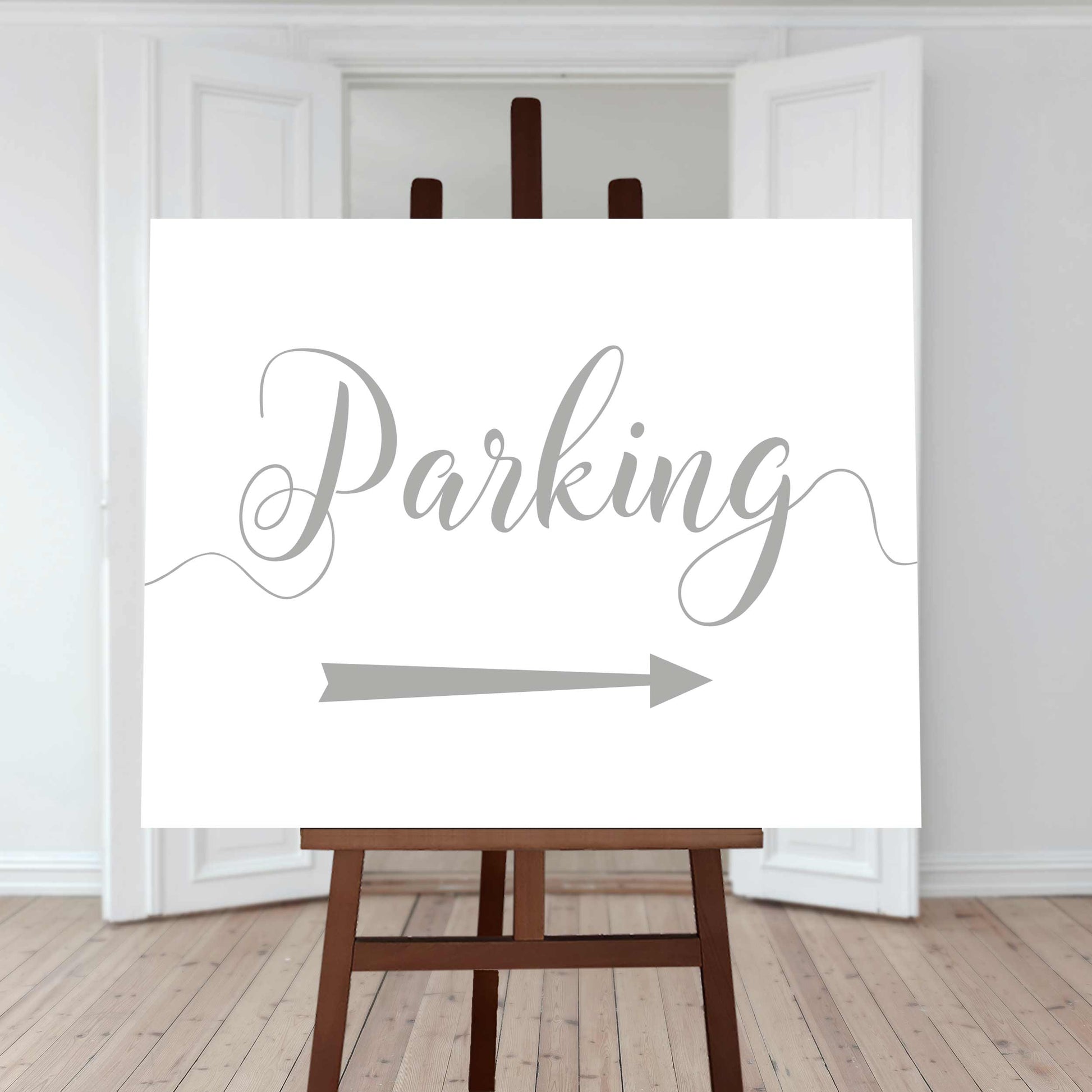 silver wedding car park directions sign with an arrow pointing right