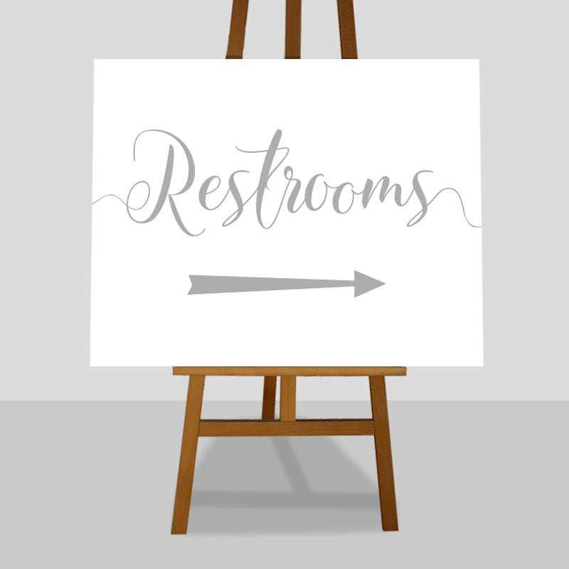 silver wedding restrooms arrow sign on an easel