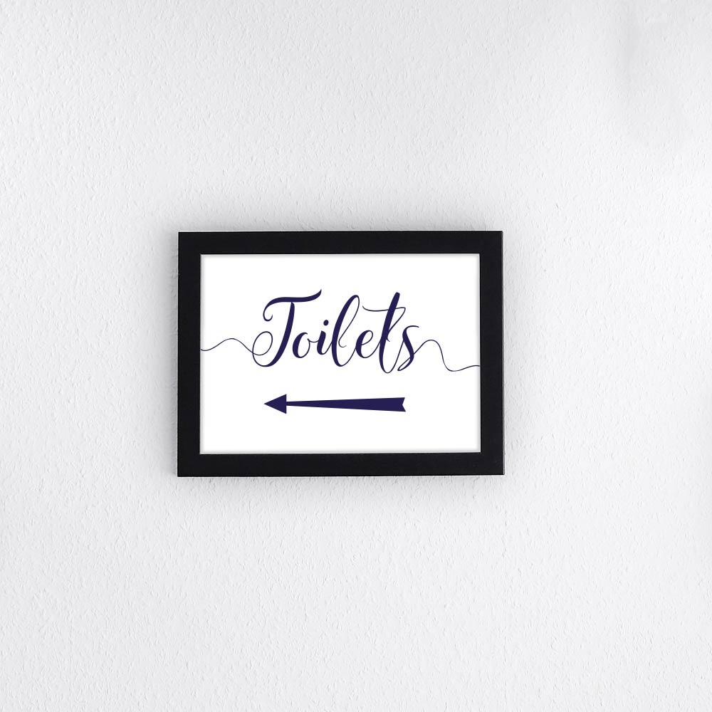 navy toilets sign with directional arrow