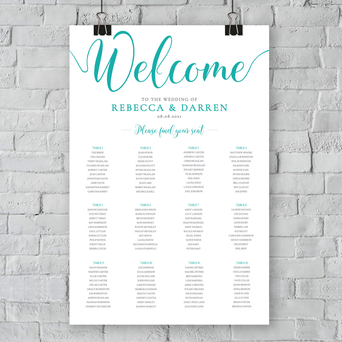 turquoise wedding seating chart against outside wall