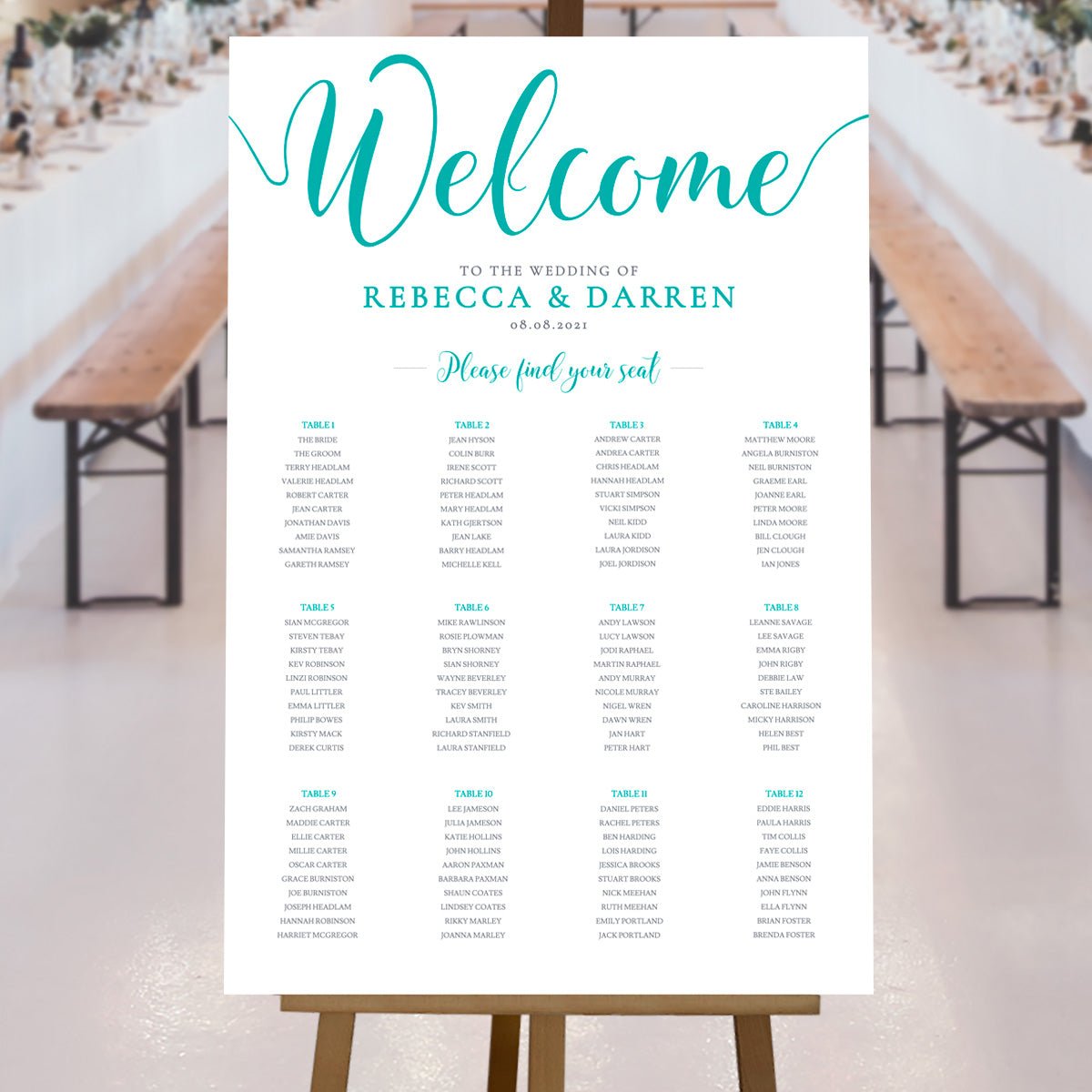 turquoise seating chart at an outdoor wedding