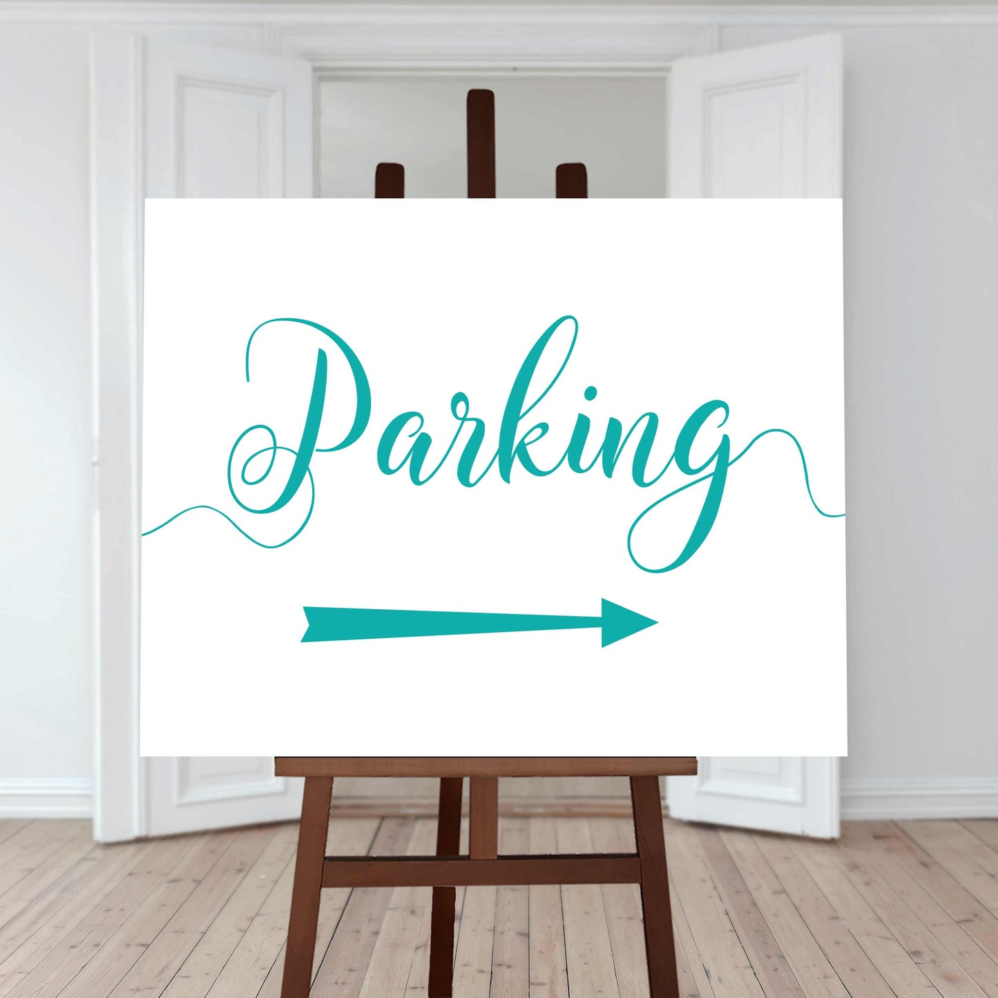 turquoise wedding car park directions sign with an arrow pointing right