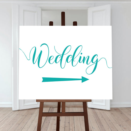 turquoise wedding directions sign with a right arrow