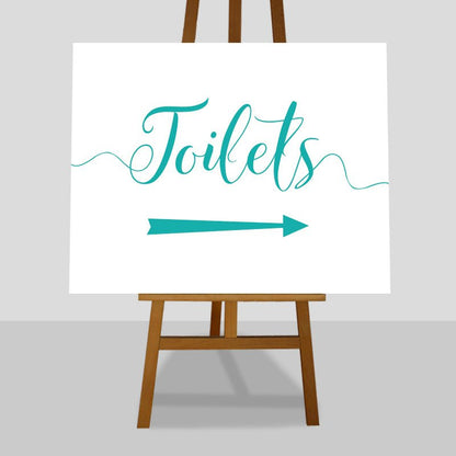 turquoise wedding toilets arrow sign on an easel