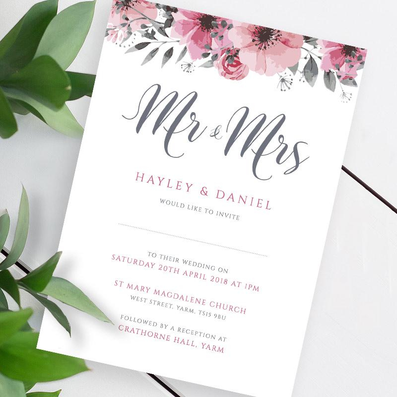 pink wedding flowers invitation template with green leaves