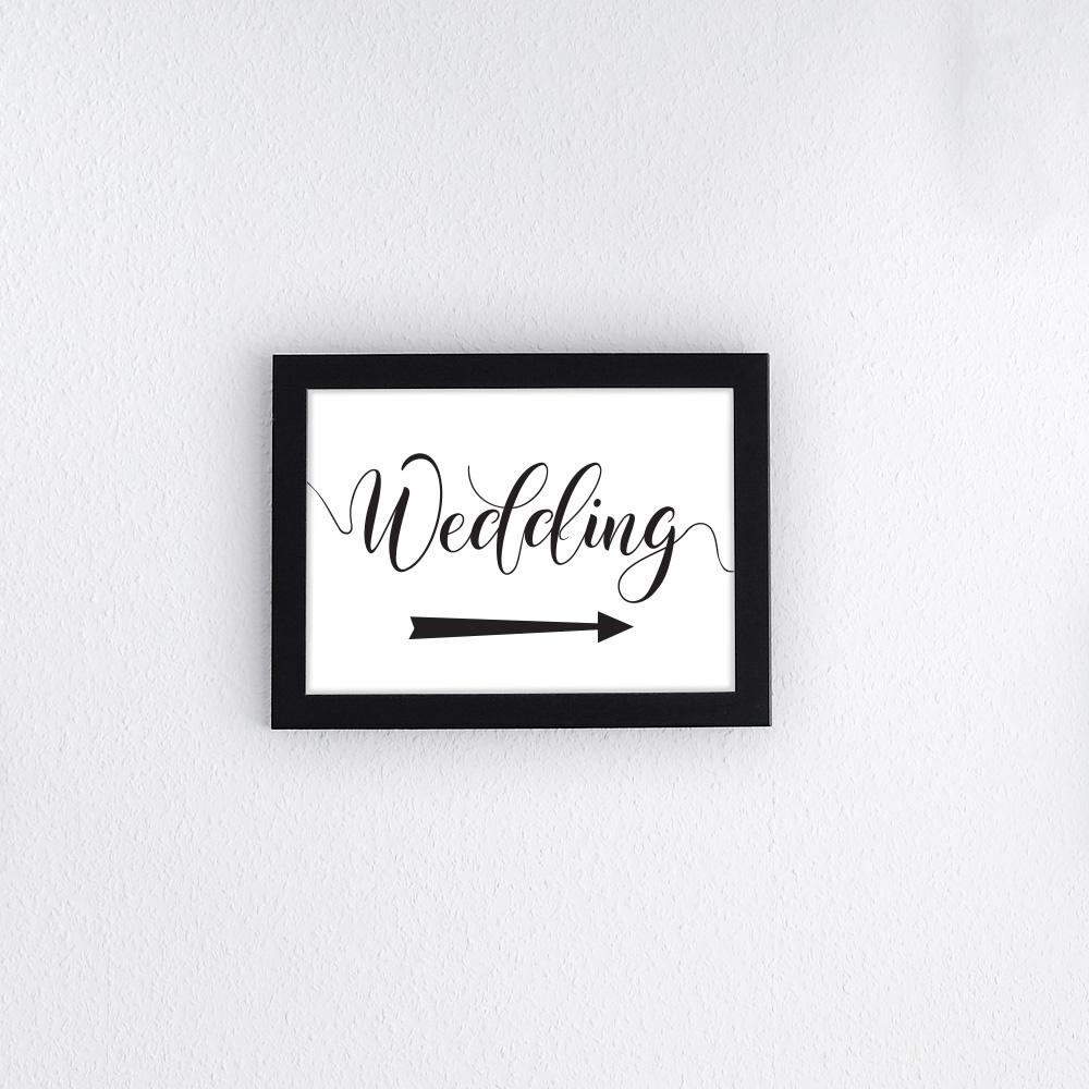 wedding sign in a black picture frame
