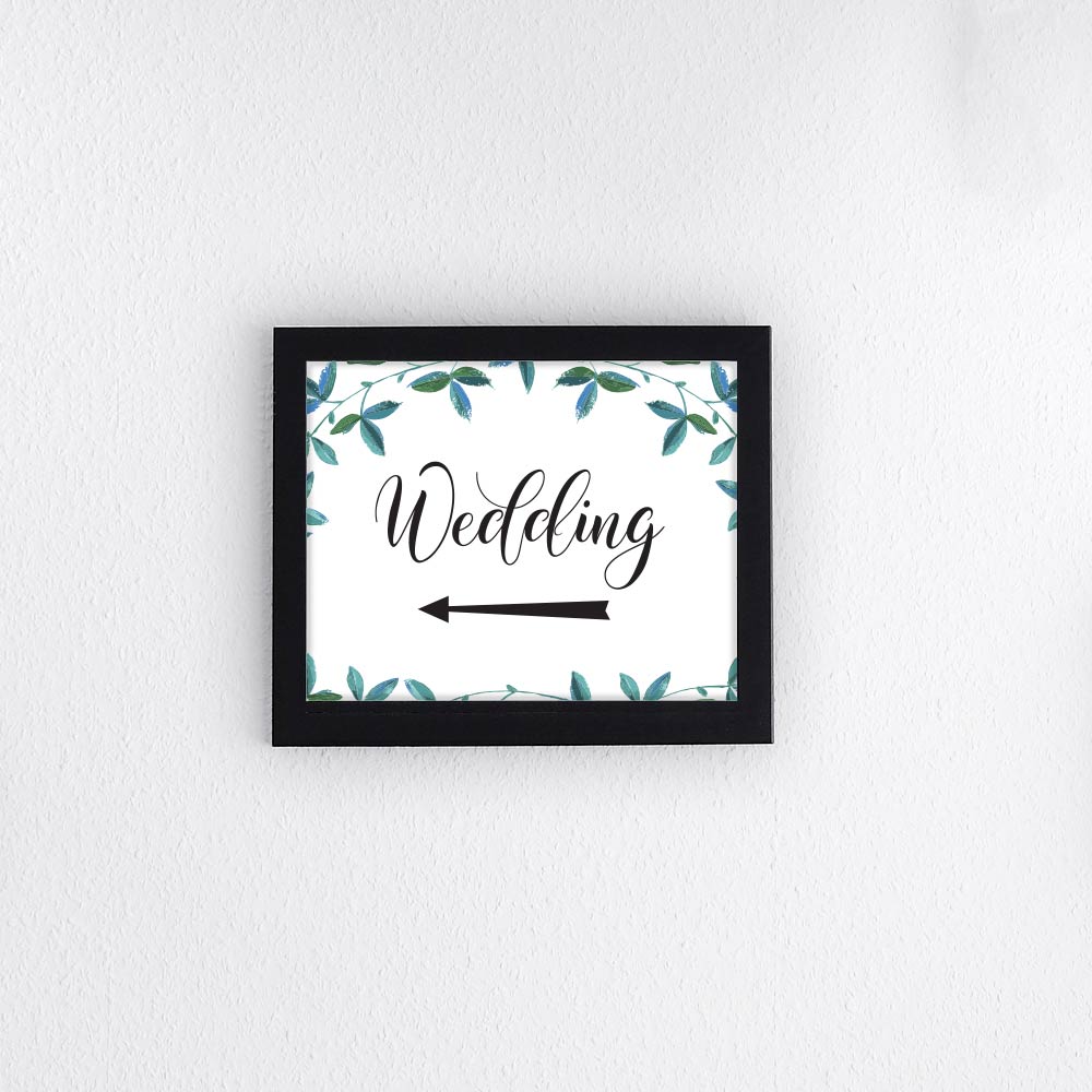 A3 printed wedding left arrow sign with eucalyptus leaves in a black photo frame