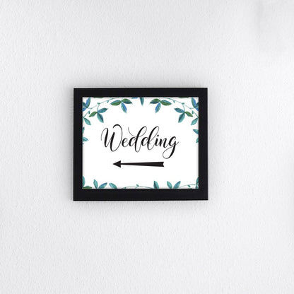 A3 printed wedding left arrow sign with eucalyptus leaves in a black photo frame