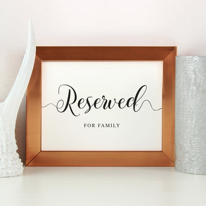 These seats are reserved for family wedding sign