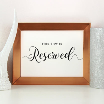wedding seats reserved for family sign in bronze frame