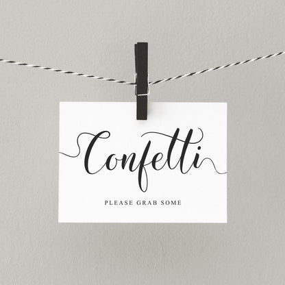 DIY confetti sign hanging from a peg