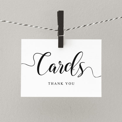 printed wedding cards sign pegged on a line