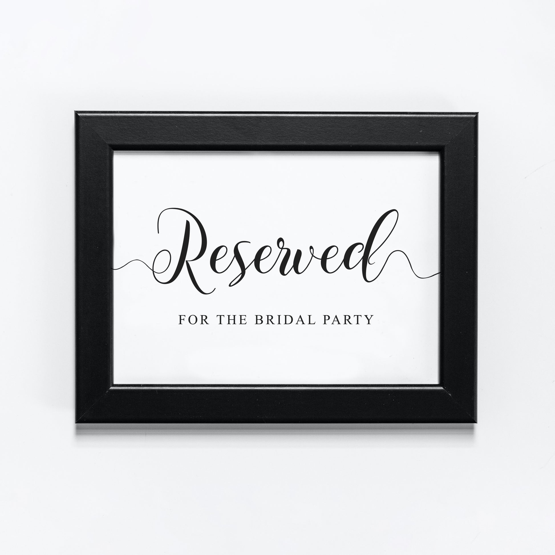 Reserved for the bridal party sign in a black frame