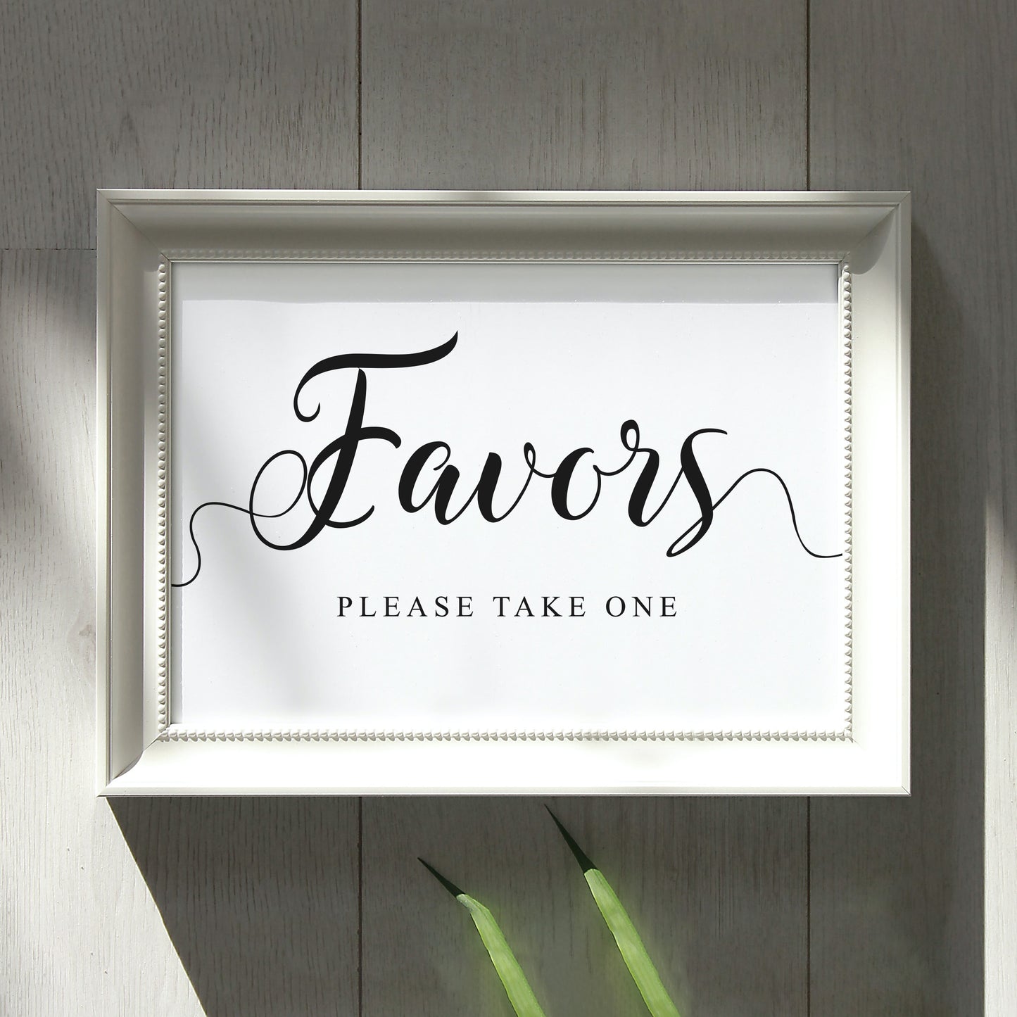 Wedding sign which reads Favors, please take one