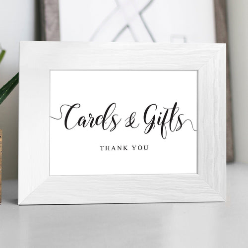 elegant cards and gifts sign in a white frame